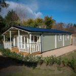 Srubový dům ennis dvoupokojový s pergolou