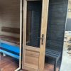 Dřevěná čtvercová sauna s terasou 3 m